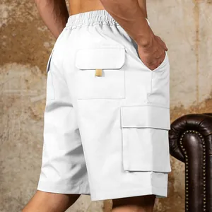 Detailed view of white men's outdoor cargo shorts with side pockets and elastic waist