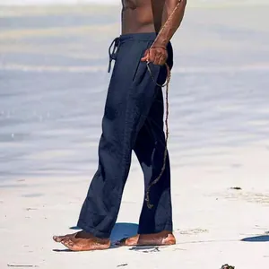 Men's navy blue cotton linen trousers in a loose casual wide-leg style for summer beach wear