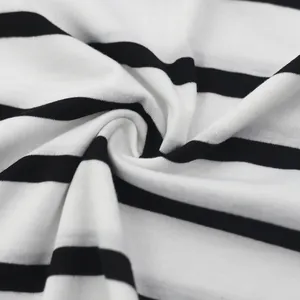 Close-up of black and white striped breathable fabric for men's casual T-shirt