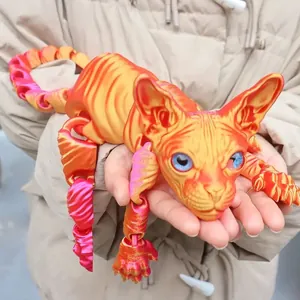Detail view of large 3D printed articulated Sphynx cat figure with vibrant gradient color.
