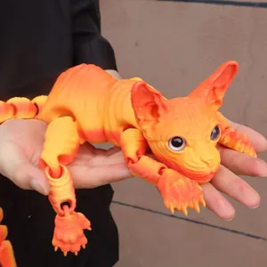 Close-up macro view of articulated 3D printed orange Sphynx cat toy with movable joints