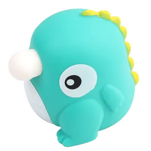 Cute teal dinosaur squishy toy with popping bubble for stress relief and fun.