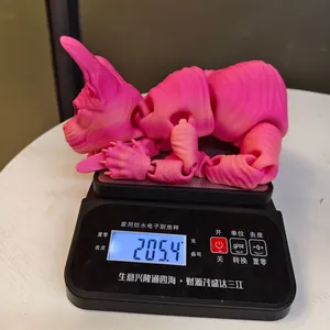 Detailed weight measurement of a pink articulated 3D printed hairless cat ornament
