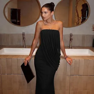 Elegant black strapless evening dress with a draped pleated bodice detail on a model.