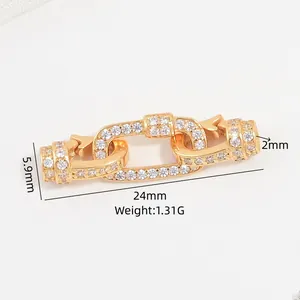 Detail of gold-plated S925 sterling silver rectangular link clasp with pavé white stones