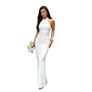 Elegant white backless halter neck maxi dress with unique textured fabric for evening parties