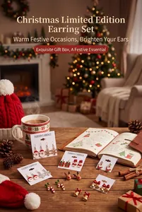 Close-up of festive Christmas earring set with Santa, reindeer and snowflake designs