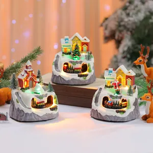 Detailed macro shot of glowing resin Christmas music box with rotating train figurines