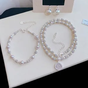 Elegante set di gioielli con perle e zirconi con collana bracciale e orecchini set