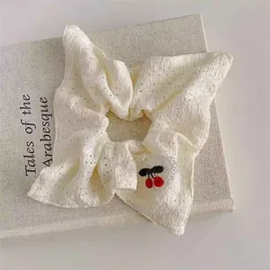 French style oversized white eyelet fabric scrunchie with cute cherry embroidery detail