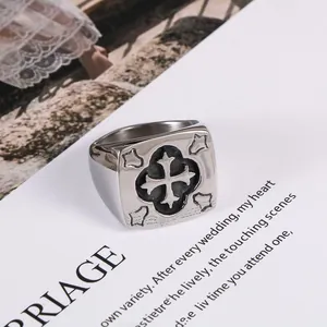 Vintage stainless steel cross signet ring for men featuring a retro embossed design