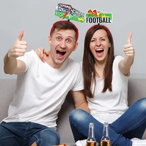 A happy couple cheering while wearing creative soccer themed decorative headbands