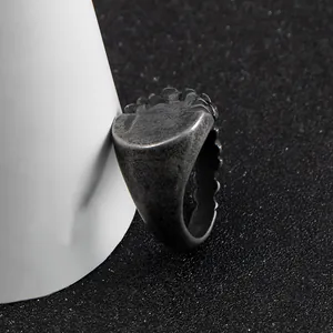 Vintage distressed stainless steel signet ring for men with unique ridged texture