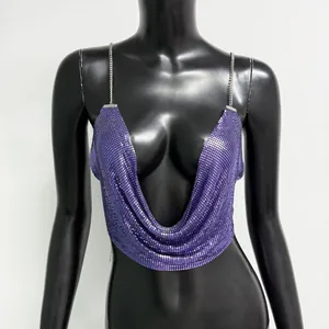 Close-up detail of purple metallic mesh sequin halter top featuring silver chain straps