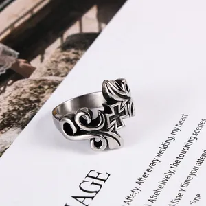 Vintage titanium steel ring featuring an intricate vine and cross pattern for men