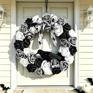 Elegant Halloween door wreath with black and white roses, crow, and spider bow ornament