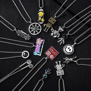 Various hip-hop titanium steel pendants including robot and astronaut designs
