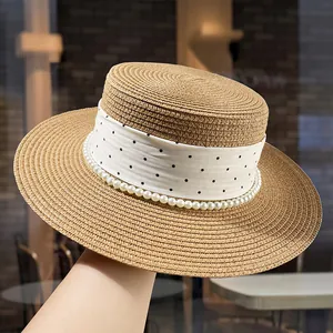 French flat top straw hat with pearl and polka dot ribbon for sun protection