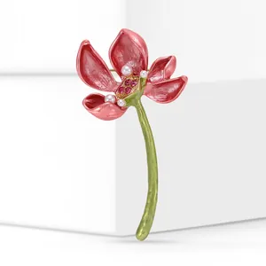 Elegant pink lotus brooch with enamel petals and sparkling crystals, alloy detail view.