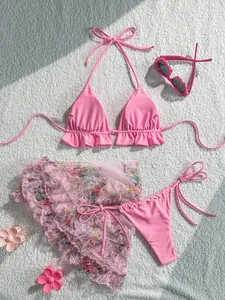Pink three-piece bikini set featuring a ruffled top, tie-side bottom and floral sarong.