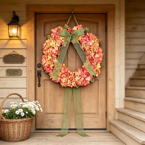 Elegant pink hydrangea door wreath with large green burlap ribbon for home porch decor
