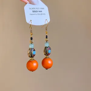 Vintage ethnic style resin dangle earrings with orange beads and silver 925 ear hook