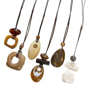 Set of vintage resin pendant long necklaces with chic marbled ink-wash texture