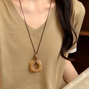 Detail of a retro New Chinese style necklace with a woven rattan pendant