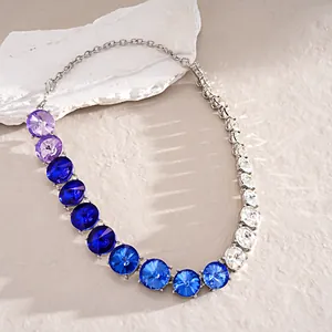 Detailed view of heavy rhinestone necklace with purple and blue gradient crystals