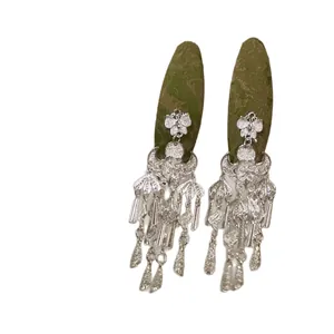 Elegant silver Chinese style hair clip with bell tassels and floral patterns for women