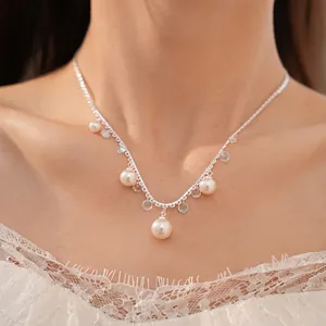 Elegant silver-tone lace-style choker necklace featuring clear zircons and hanging white pearls