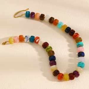 Close-up of colorful dopamine beaded necklace with marbled acrylic beads and gold clasp