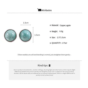 Detail view of vintage agate stud earrings with 1.5cm diameter and copper material specifications