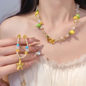 Set di collana in perline di resina e bracciale a stella marina in giallo stile vacanza