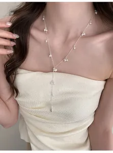 Elegant Y-shaped pearl necklace for women, delicate silver chain starry sky design detail