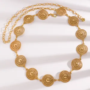 Gold ethnic style metal waist chain belt with intricate engraved medallions for dresses
