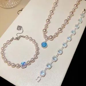 Set di Gioielli in Perla Artificiale e Zirconia di Lusso per Donna Elegante Collana e Bracciale con Pendente Rotondo Argento