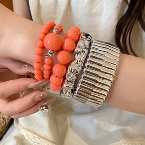 Bohemian stackable acrylic beaded bracelets and silver metallic textured bangles set