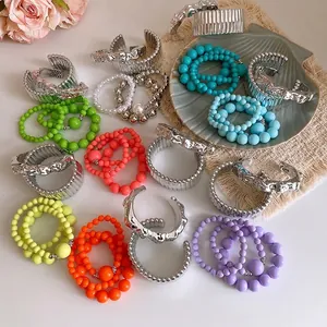 Bohemian colorful acrylic beaded bracelets and silver chunky metallic cuffs set
