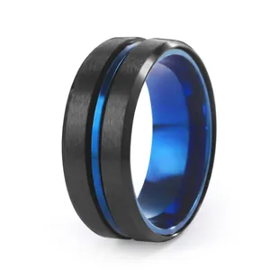 Men's black brushed stainless steel ring with vibrant blue inner plating and groove