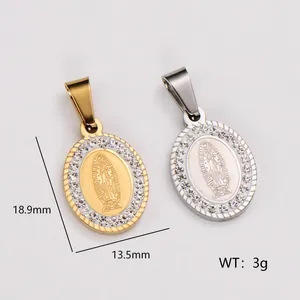 Detailed view of vintage oval stainless steel pendants with Virgin Mary engraving and crystals