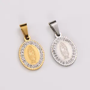 Detailed close-up of vintage oval Virgin Mary pendants with 18k gold plating and rhinestones