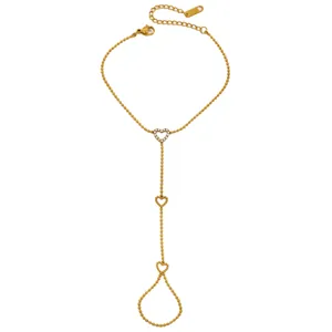Élégant bracelet de main cœur en acier inoxydable doré avec de jolies perles et cristaux