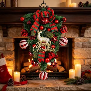 Upside down Christmas swag wreath with reindeer and red ornaments for fireplace decor