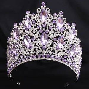 Detailed macro view of luxury bridal crown with purple crystals and leaf rhinestones