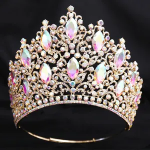 Luxury gold bridal tiara featuring marquise AB crystals and sparkling rhinestones.