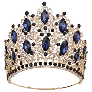 Intricate detail of a luxurious European bridal crown with blue crystals and gold leaf motifs
