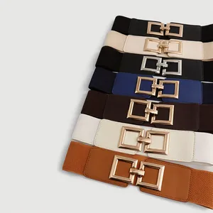 Various colors of wide elastic waist belts featuring stylish gold interlocking square buckles.