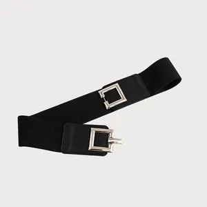 Close-up of black elastic waist belt with stylish silver square interlocking buckle