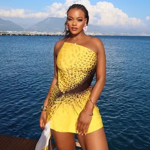 Chic yellow leopard print ruched mini dress featuring a one-shoulder neckline and asymmetrical hem